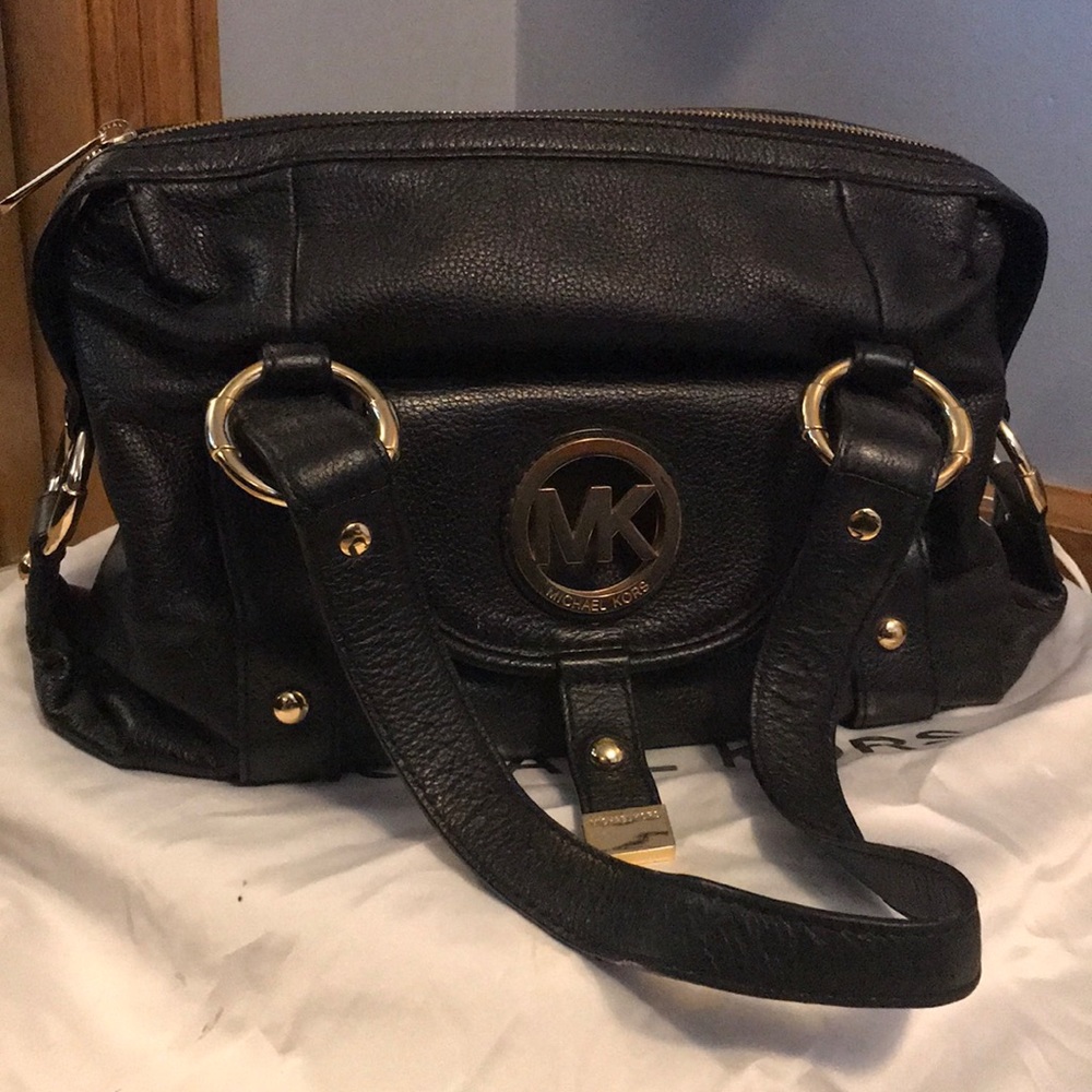 Black and Gold Michael Kors handbag